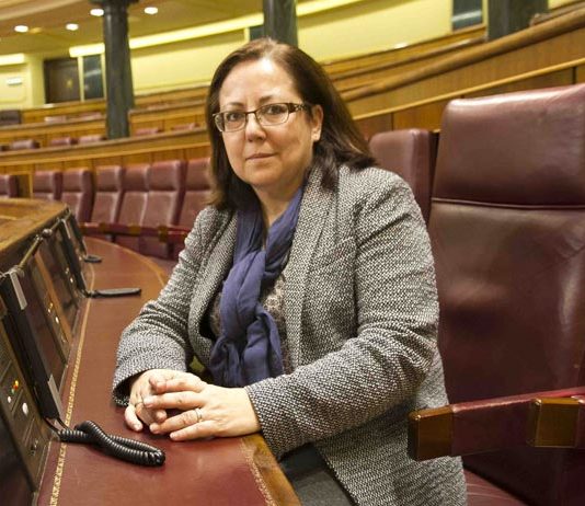 María Jesús Moro, autora del artículo, en su escaño del Congreso. FOTO: Confilegal